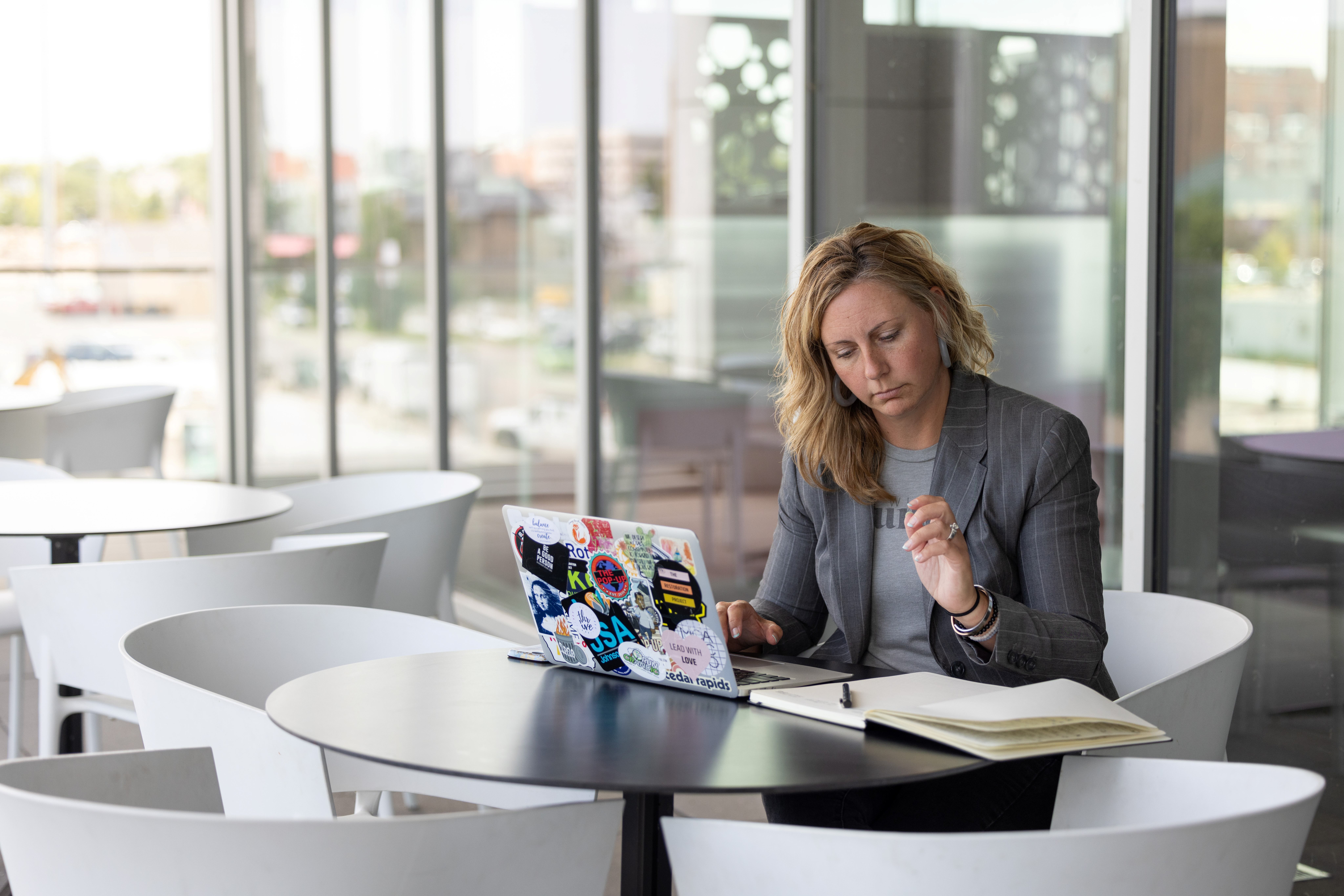 Woman reviewing notes in journal